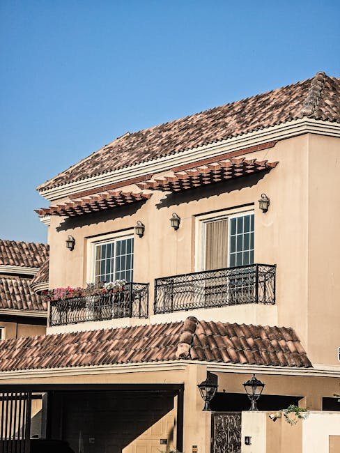 Beautiful Mediterranean-style architecture in Dubai under clear blue sky.